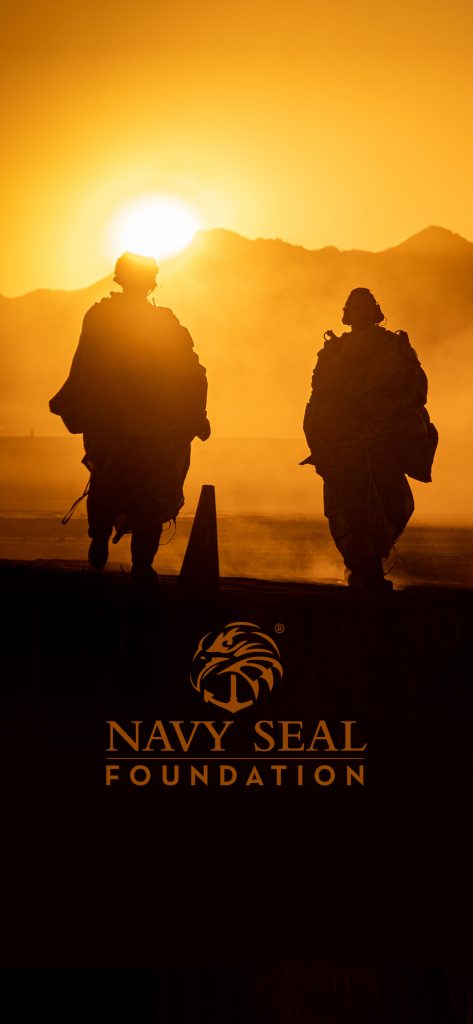 Two people walking at sunset with "Navy Seal Foundation" logo below, suitable for navy seal wallpaper.
